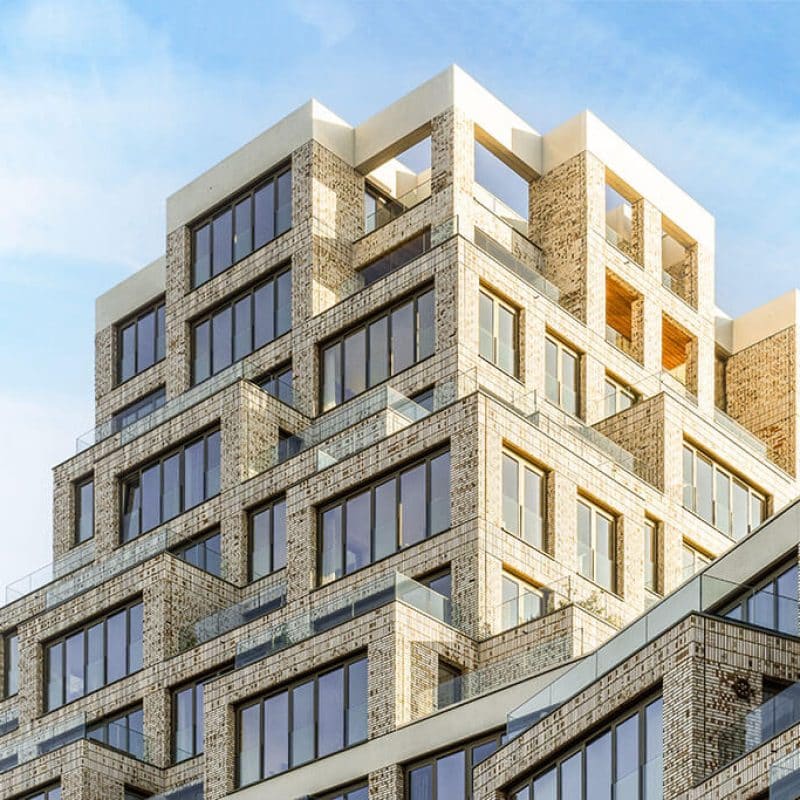 Modern-apartment-building-NPMF9PY-prnpx3ftkpcwk3uvaquqjijwqxjx55qaro3h67ie68