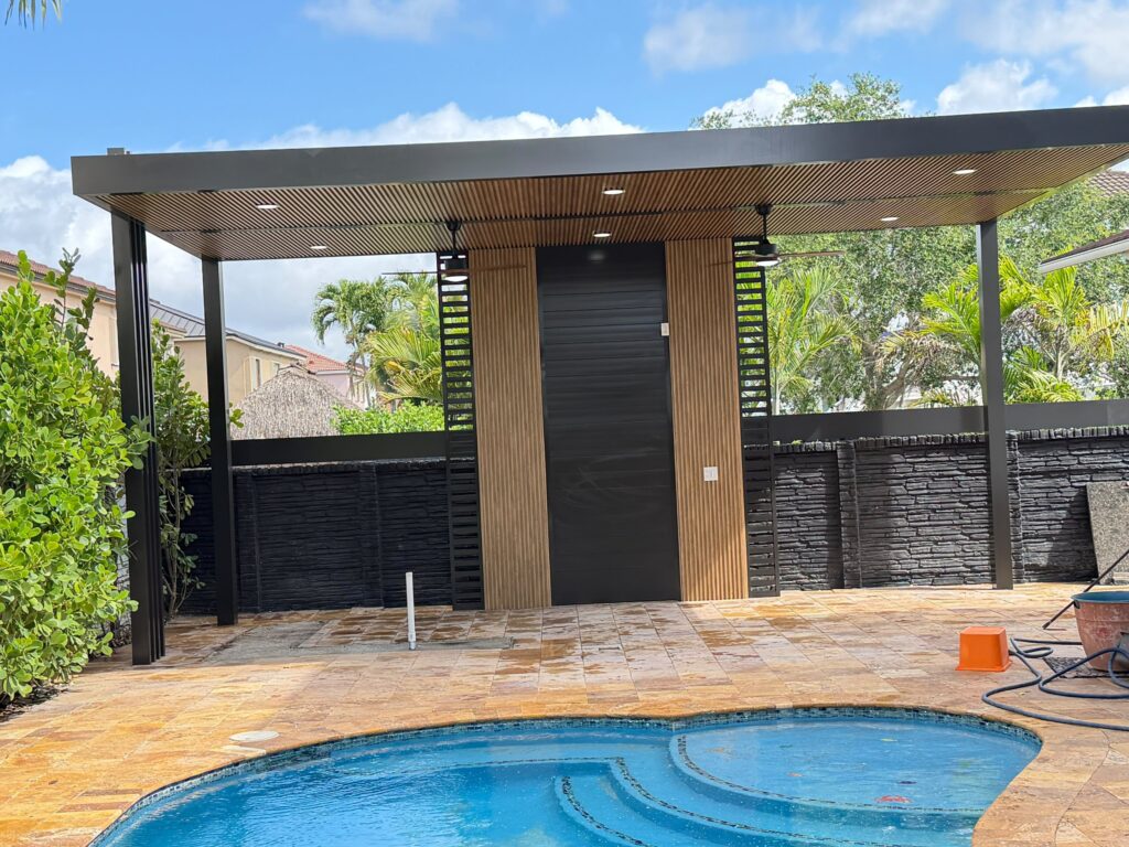 Covered terrace and outdoor kitchen on a canal-front property