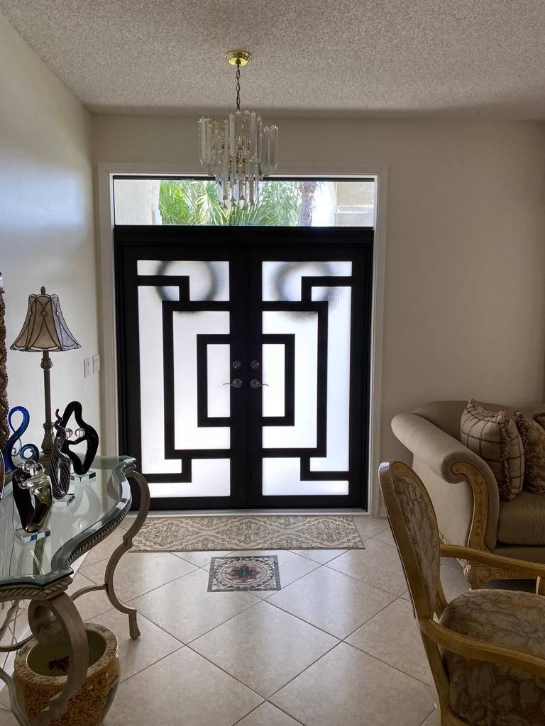 Elbaz installation: the same style of impact entry door seen from inside the hallway