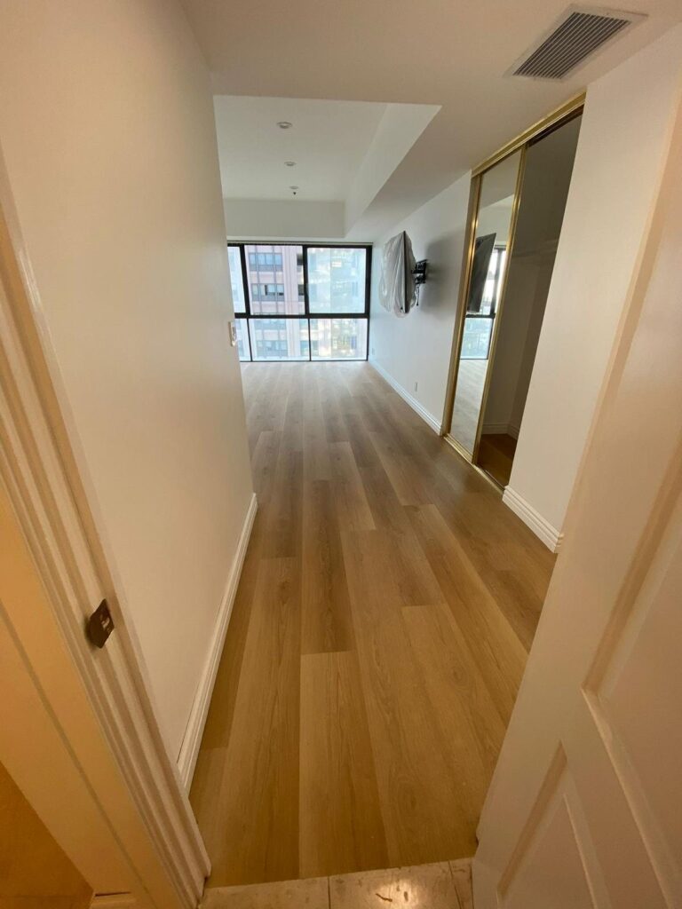 Light plank corridor with the boards running along its length