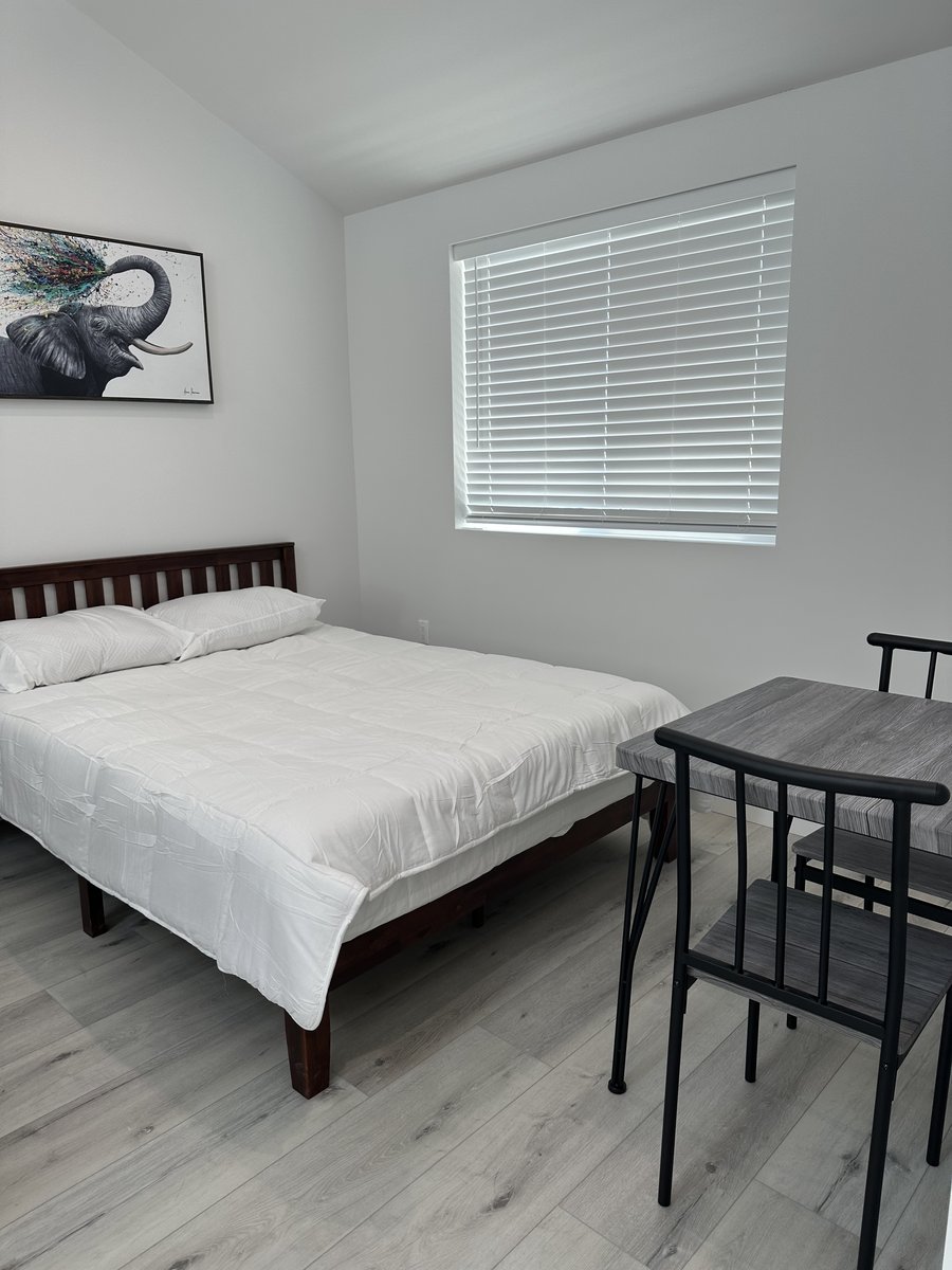 Sleeping area within the open plan of a studio accessory dwelling unit