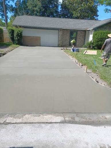 Concrete driveway under construction with the surface not yet finished