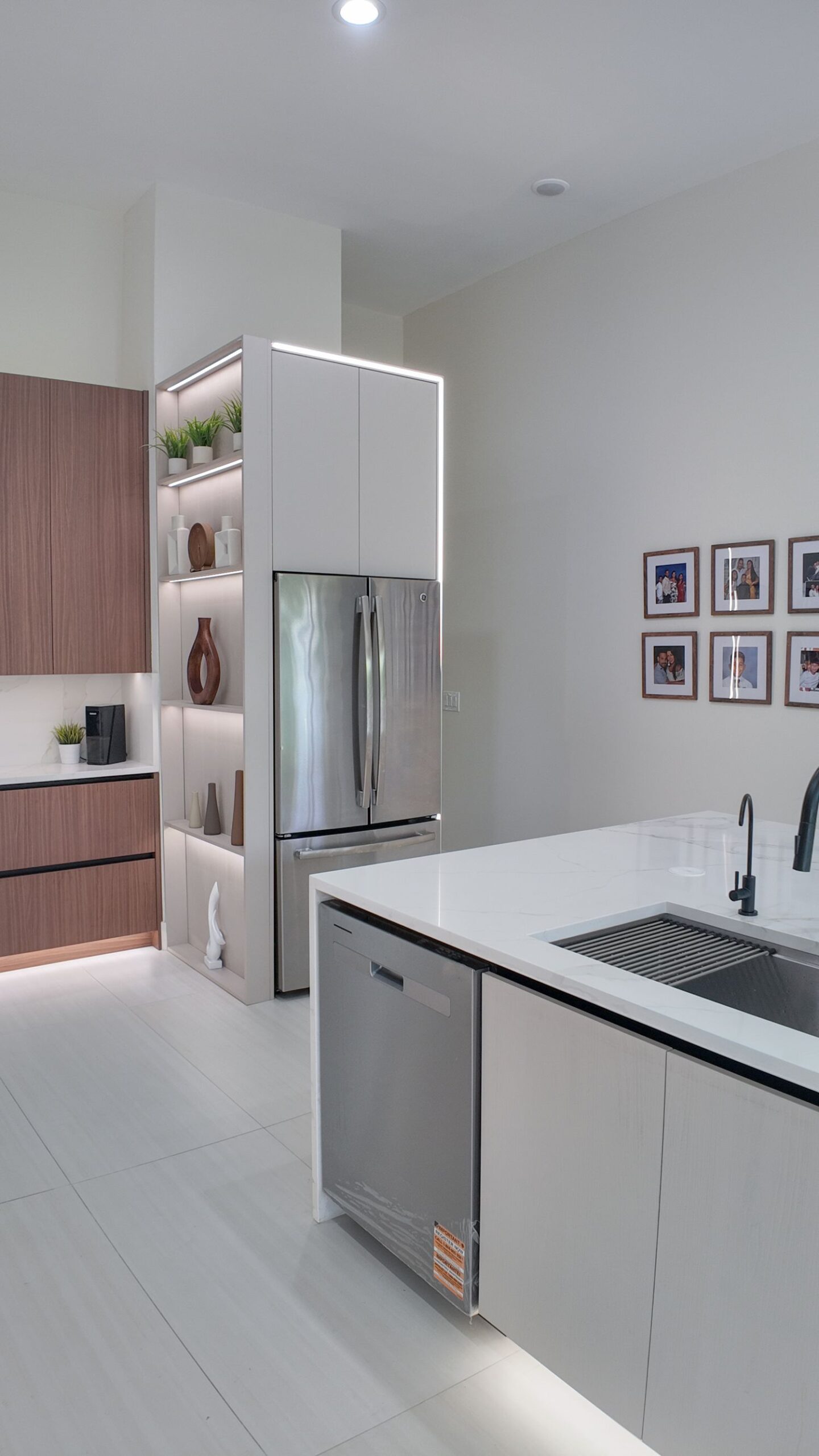 Full-height cabinetry and integrated ovens in a contemporary kitchen