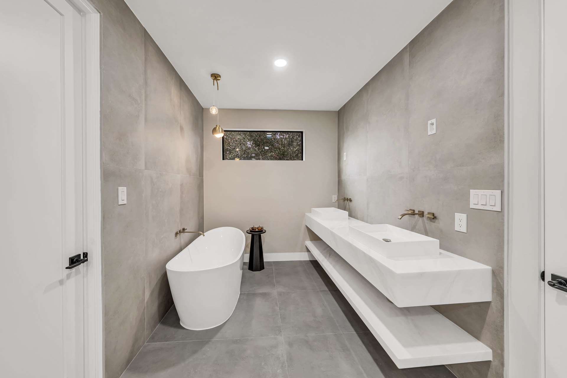 Real Elbaz Construction project photography from six completed South Florida kitchens and bathrooms, assembled as a moving sequence