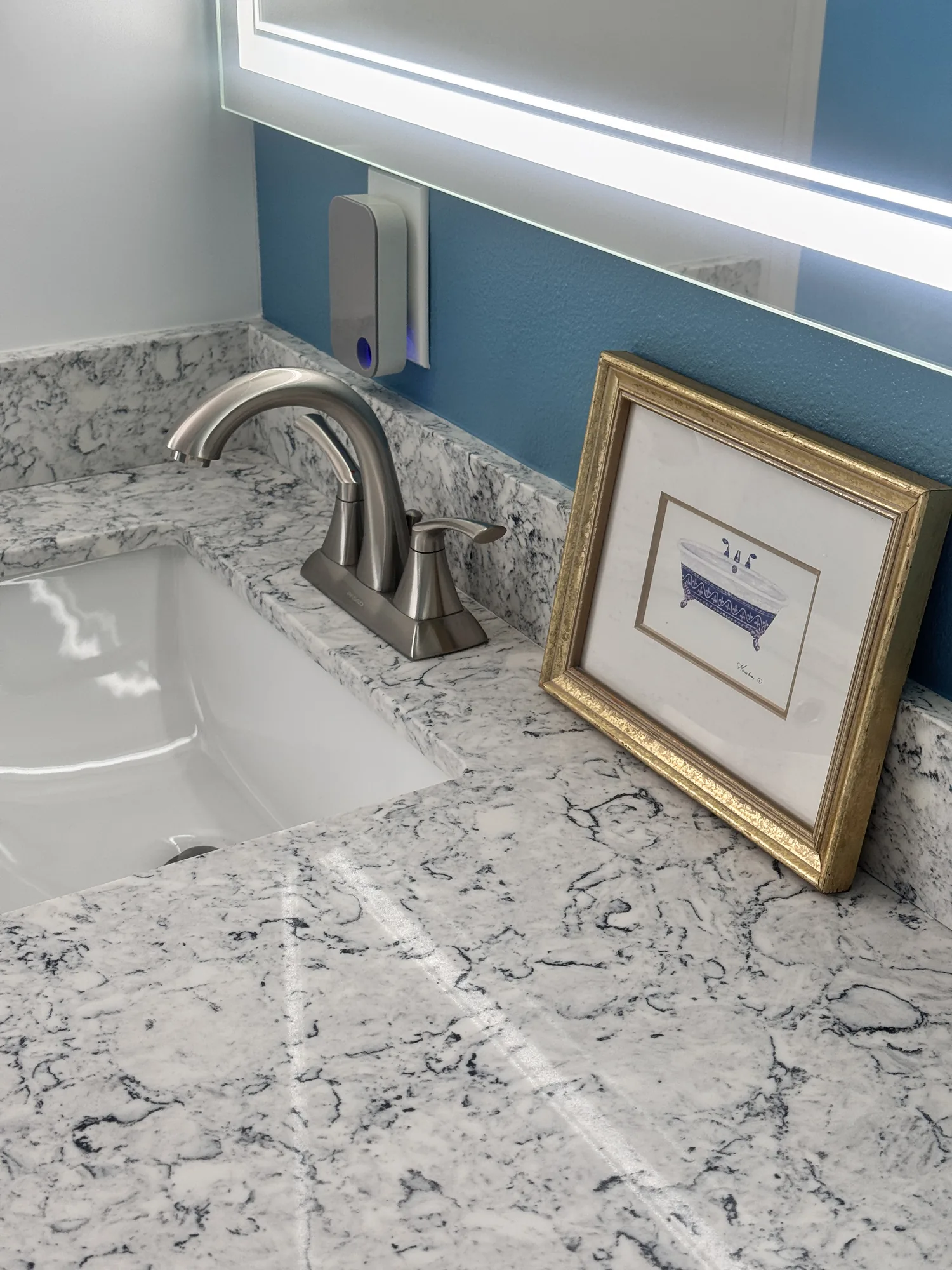 Basin and tap detail in a completed bathroom remodel