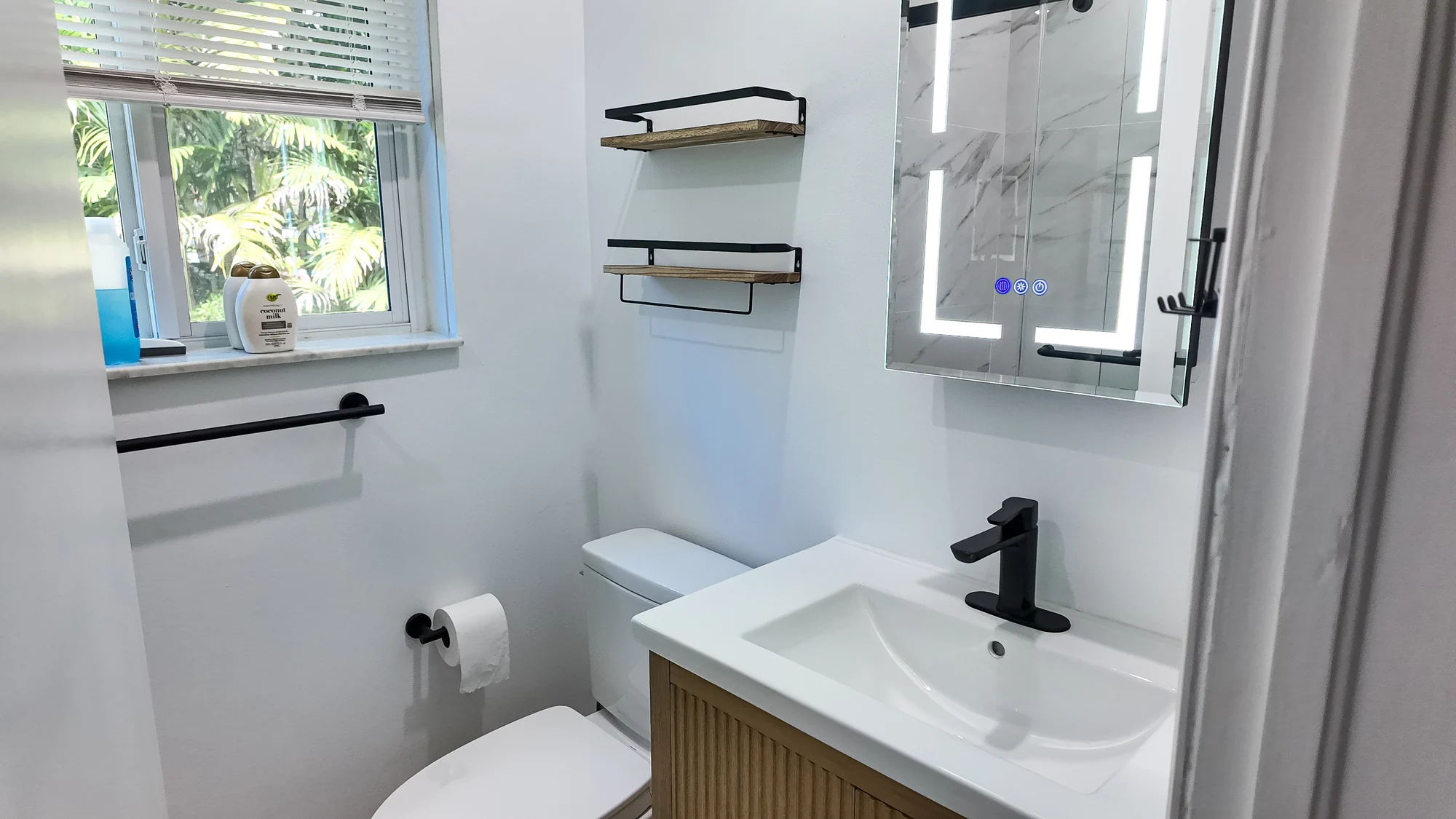 Completed small bathroom with natural light