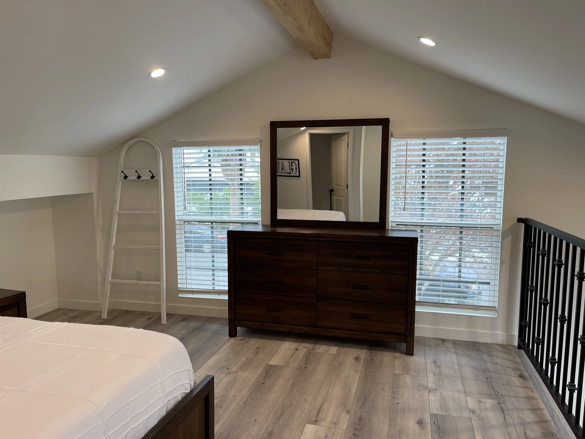 Bedroom and mirror in a finished accessory unit