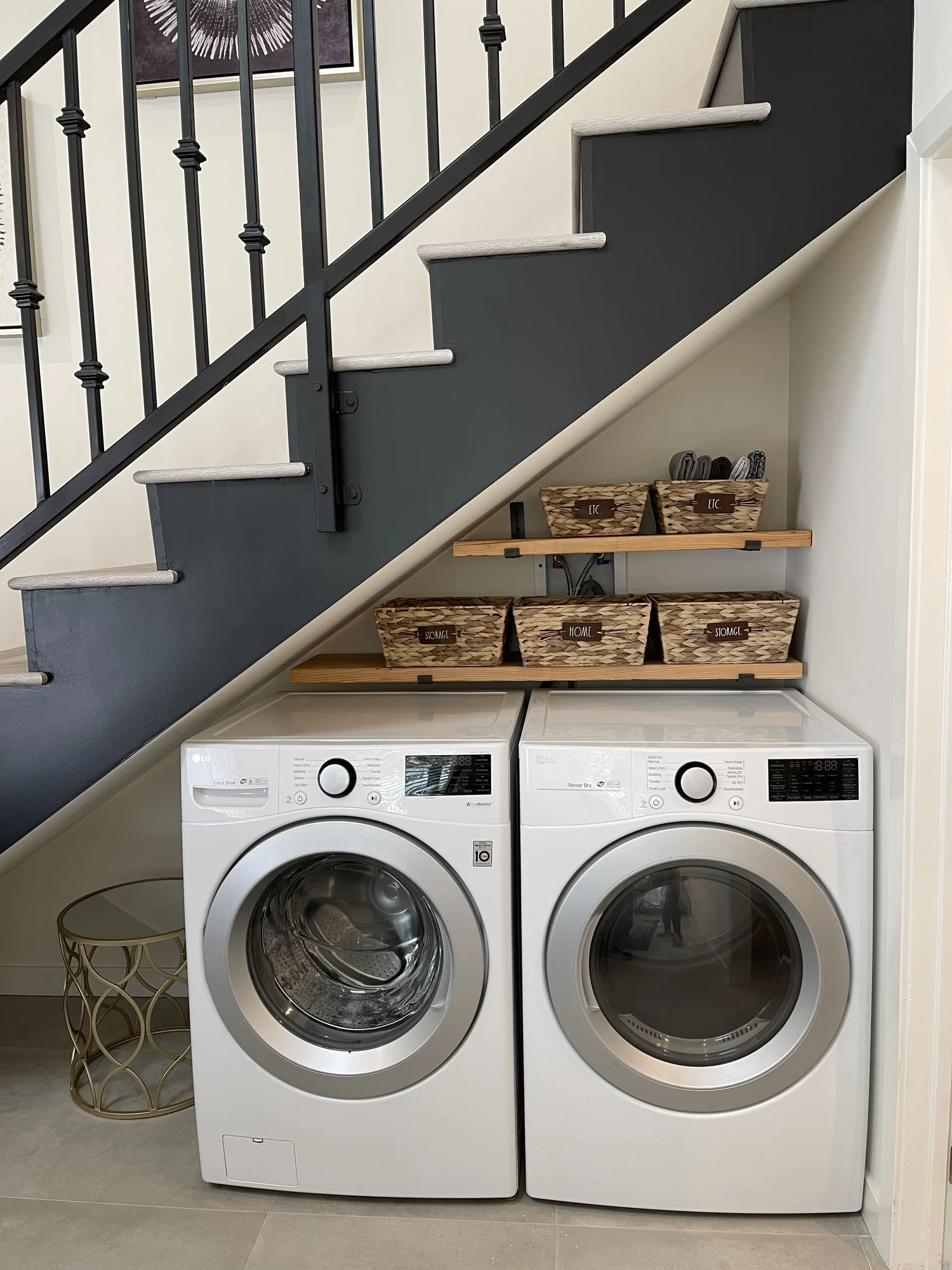 Stairs and laundry area in a completed accessory living space