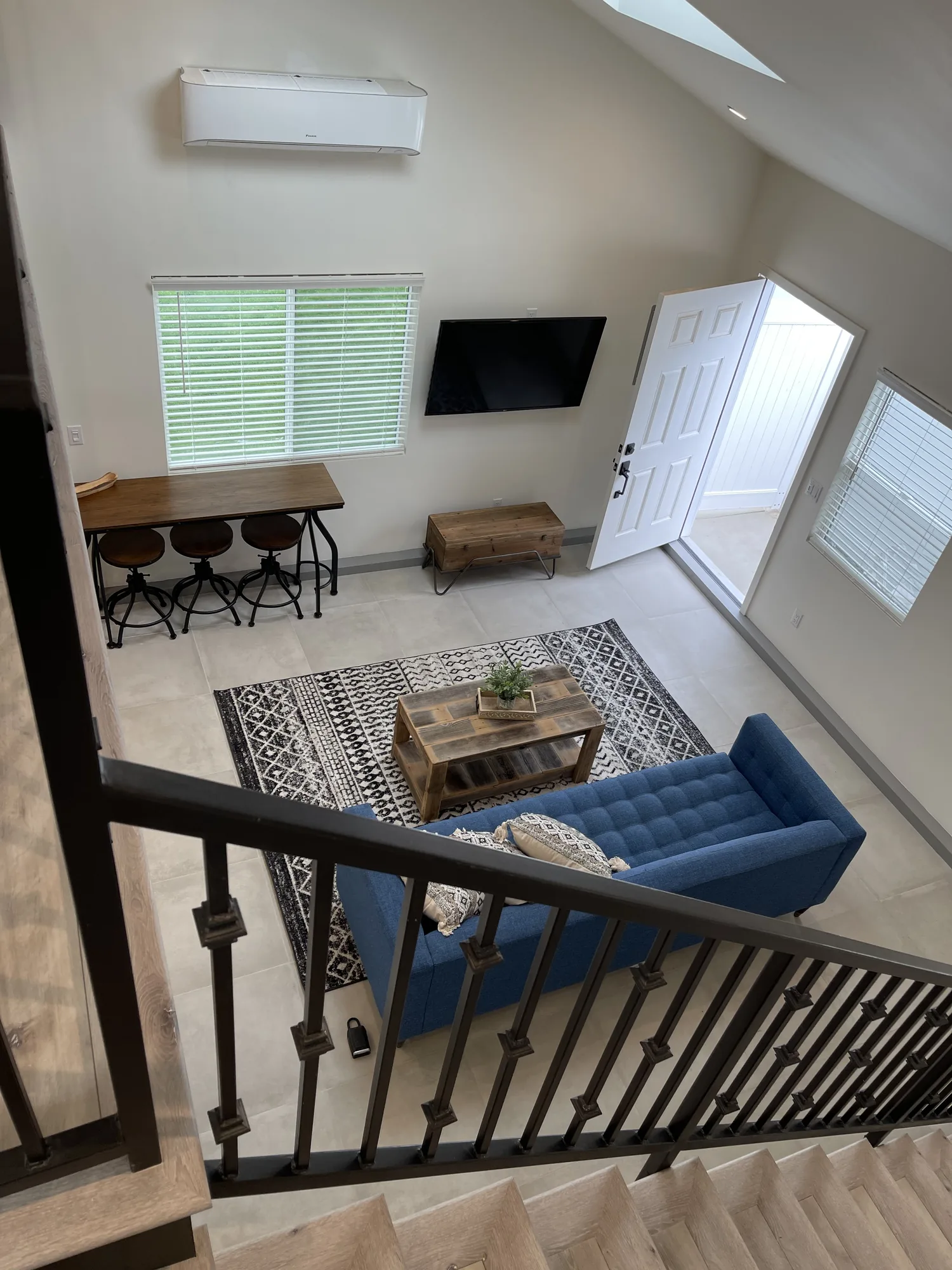Living area viewed from the mezzanine of a completed accessory unit