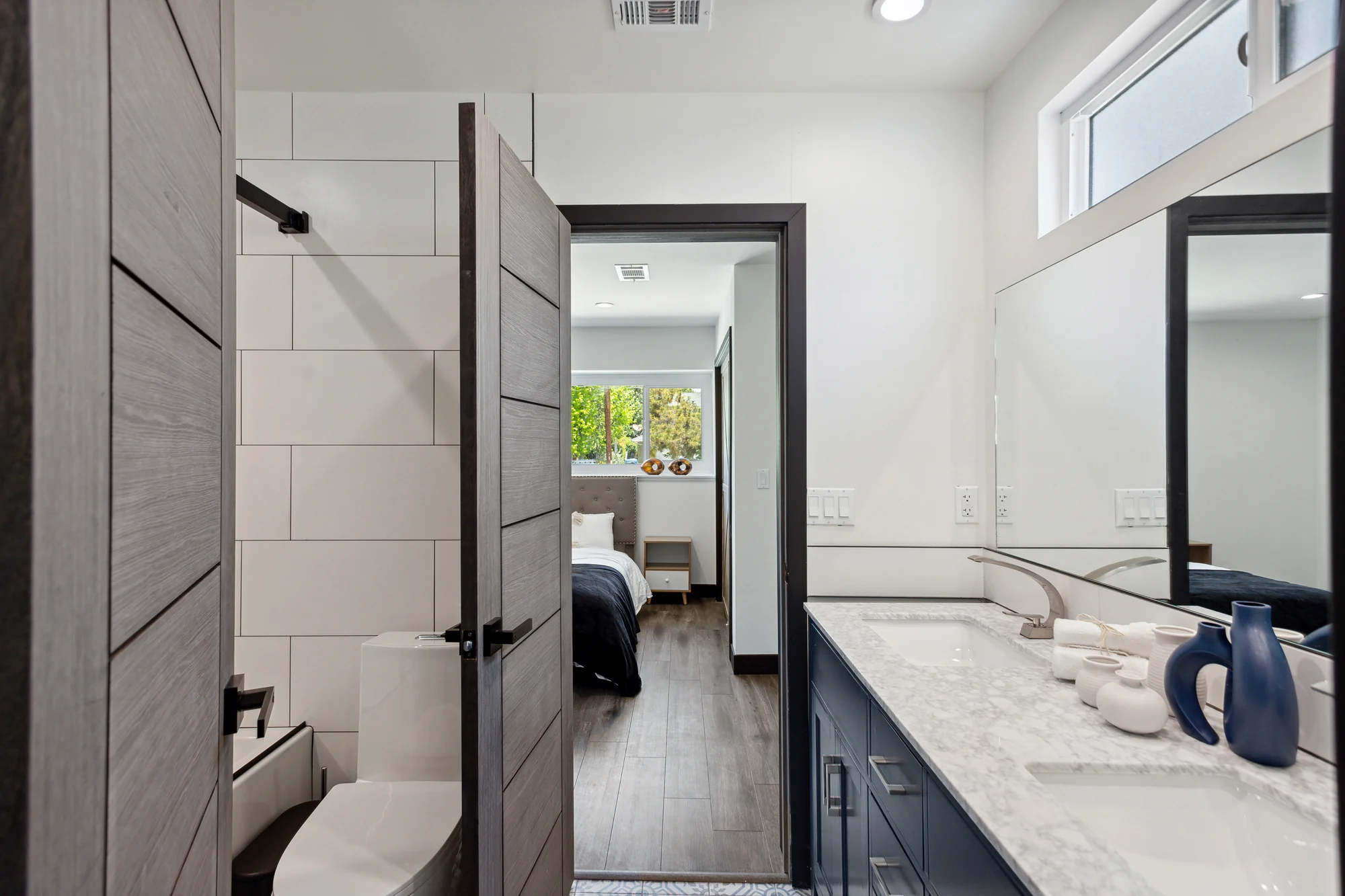Completed bathroom vanity, mirror and lighting