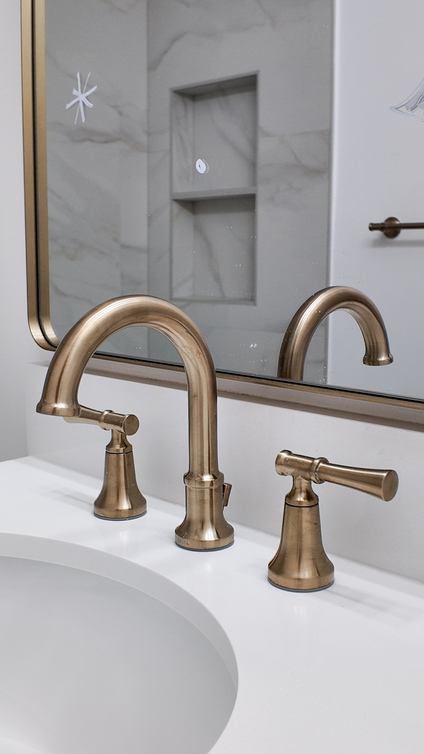 Champagne Bronze & Marble-Look Tile Bathroom Renovation