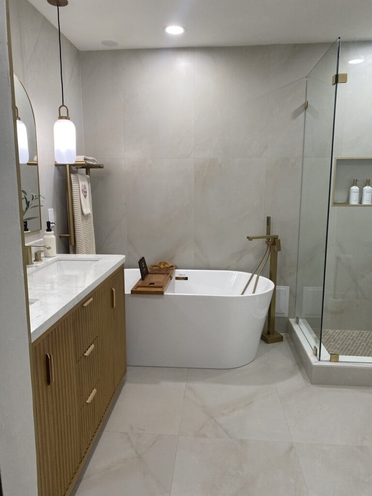 Contemporary Primary Bath Remodel with Fluted Vanity & Freestanding Tub — photo 2