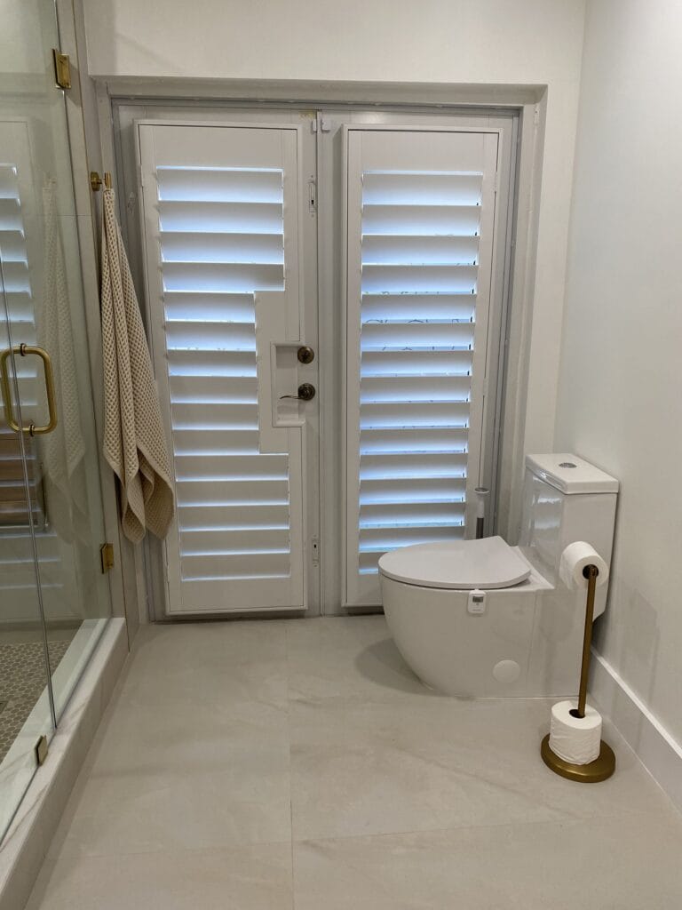Contemporary Primary Bath Remodel with Fluted Vanity & Freestanding Tub — photo 5