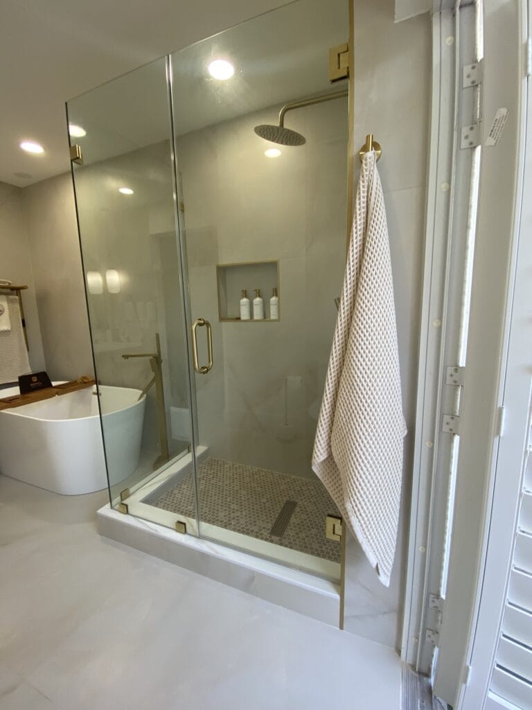 Contemporary Primary Bath Remodel with Fluted Vanity & Freestanding Tub — photo 9