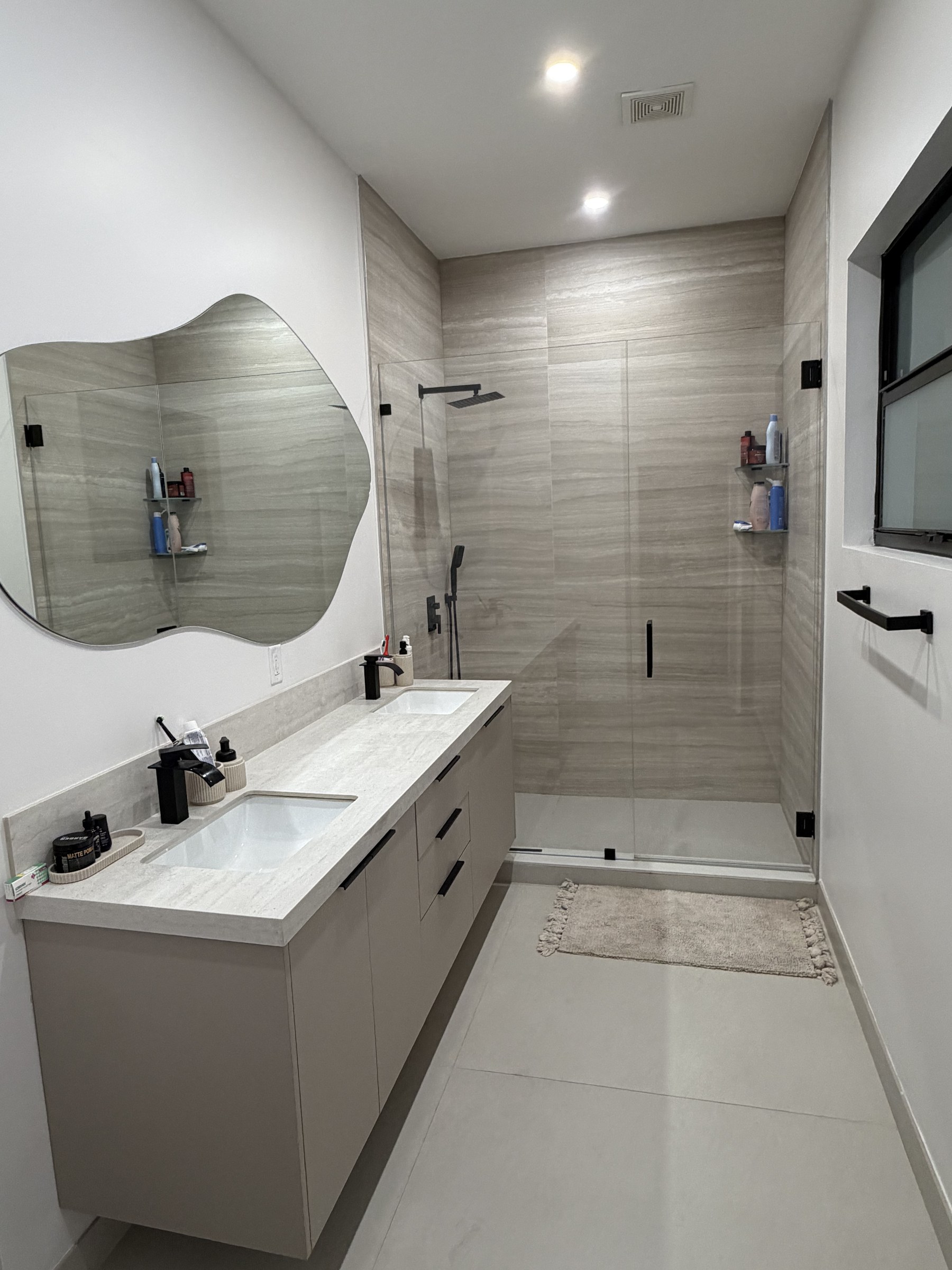 Floating Vanity Bathroom Remodel with Frameless Glass Shower
