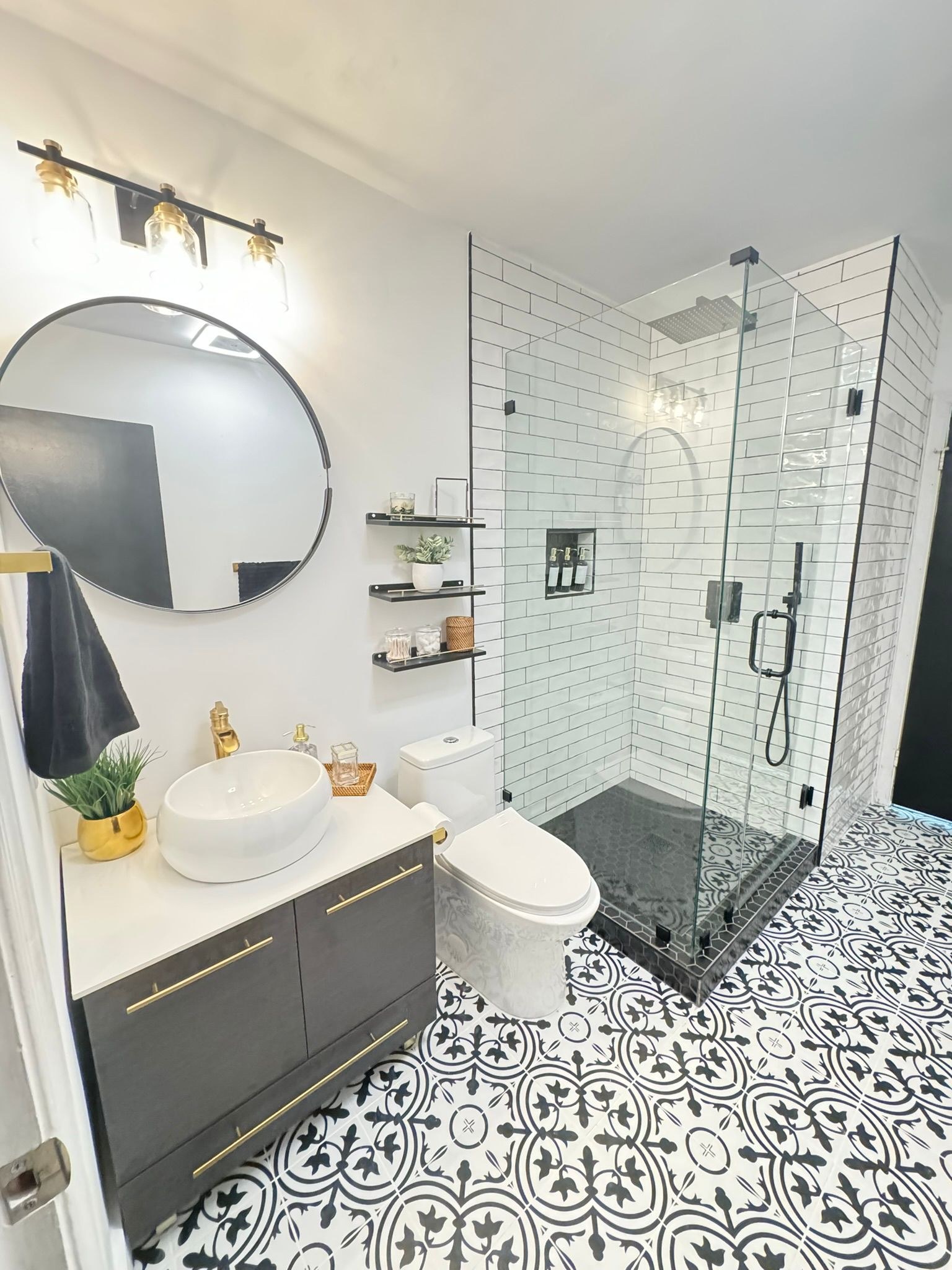 Black-and-White Cement Tile Bathroom Remodel with Frameless Glass Shower