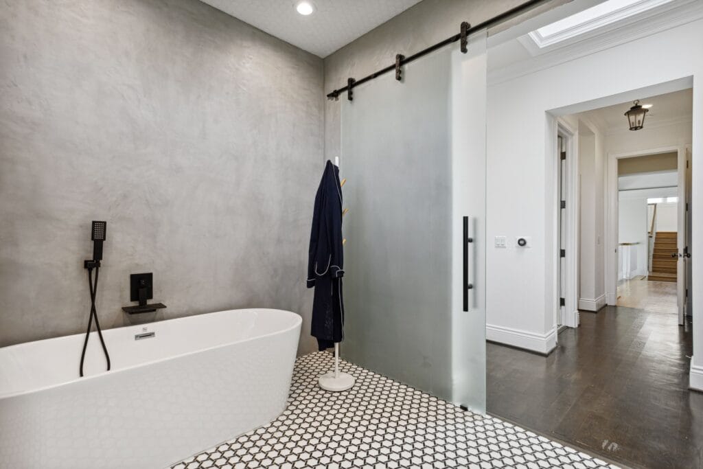 Polished-Concrete Primary Bath with Curbless Walk-In Shower — photo 11