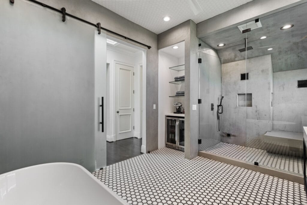 Polished-Concrete Primary Bath with Curbless Walk-In Shower — photo 13