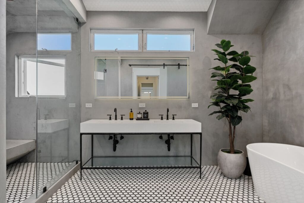 Polished-Concrete Primary Bath with Curbless Walk-In Shower