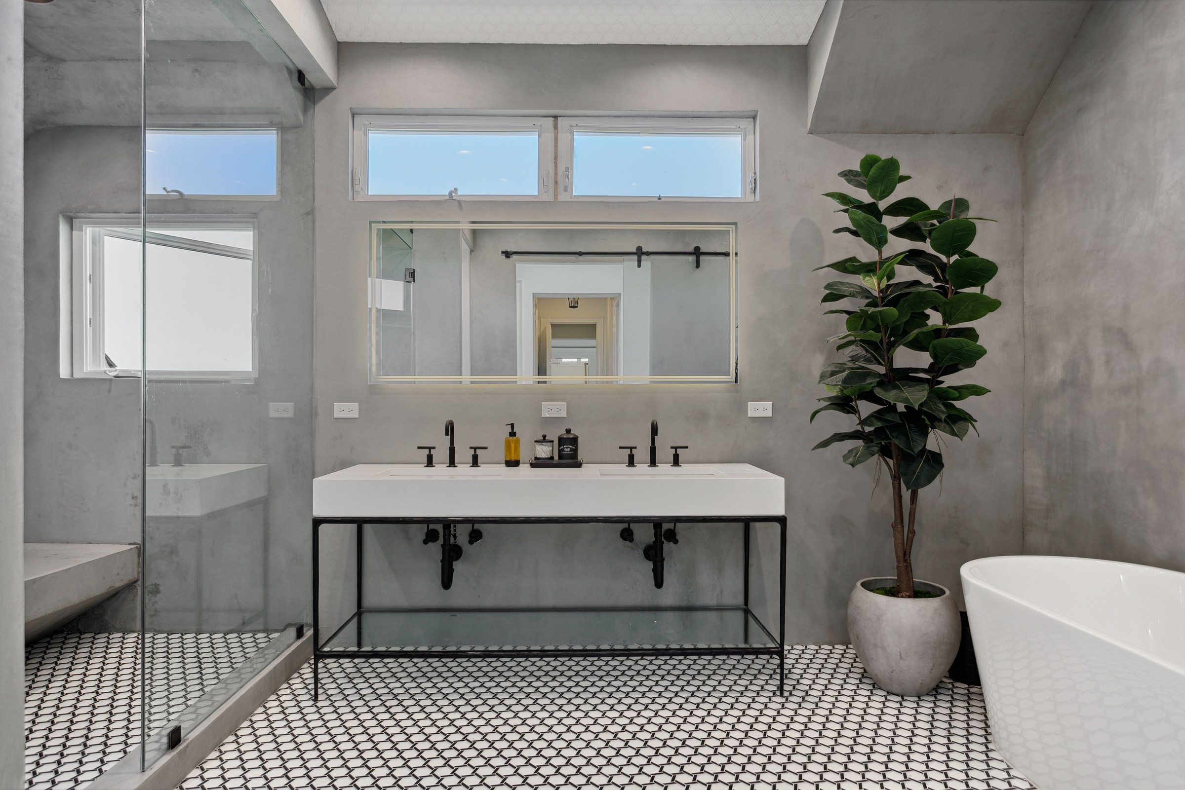 Polished-Concrete Primary Bath with Curbless Walk-In Shower