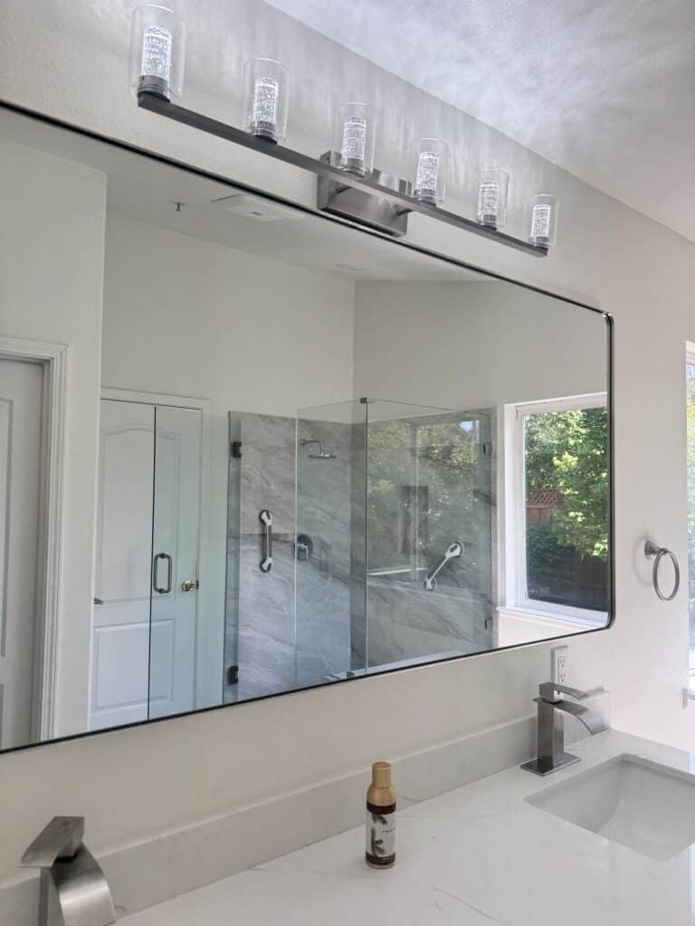 Vaulted-Ceiling Primary Bath Remodel with a Frameless Glass Shower — photo 8