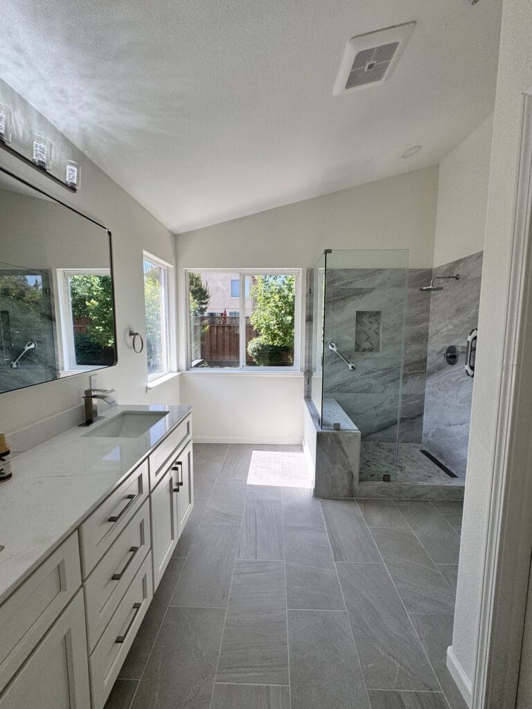 Vaulted-Ceiling Primary Bath Remodel with a Frameless Glass Shower — photo 9