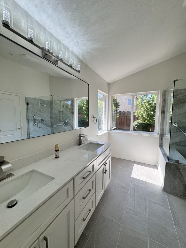 Vaulted-Ceiling Primary Bath Remodel with a Frameless Glass Shower — photo 11