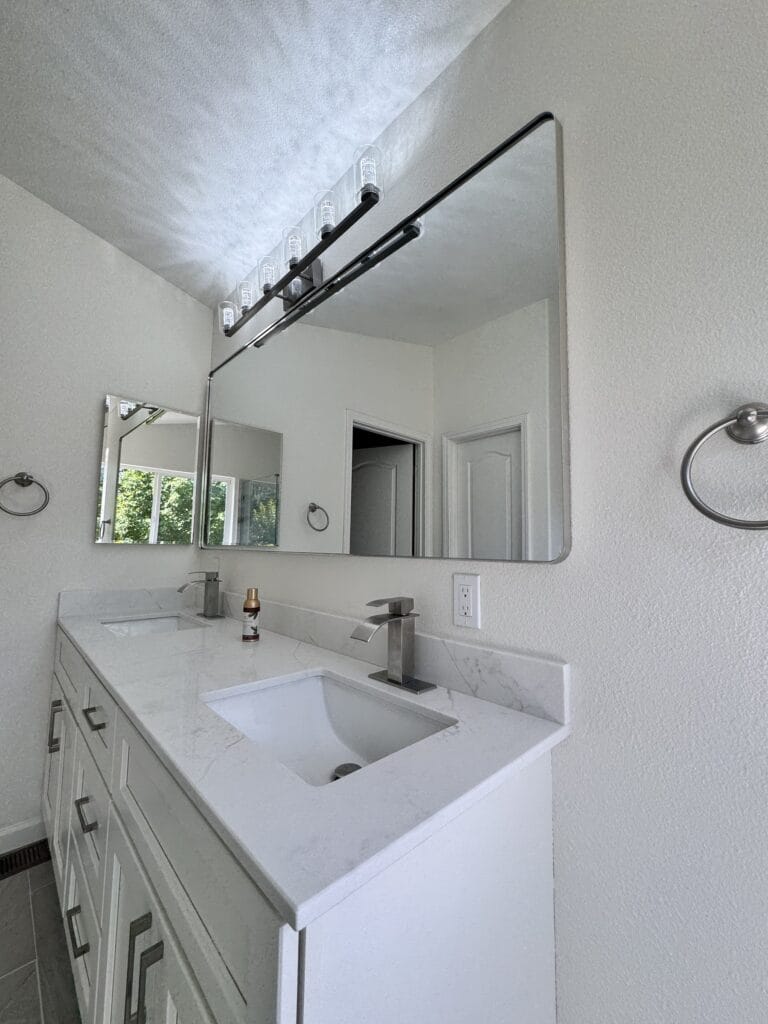 Vaulted-Ceiling Primary Bath Remodel with a Frameless Glass Shower — photo 12