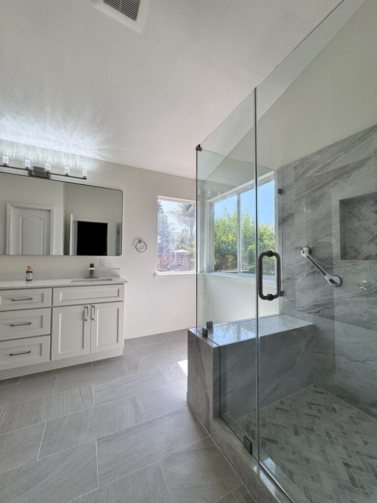 Vaulted-Ceiling Primary Bath Remodel with a Frameless Glass Shower — photo 15