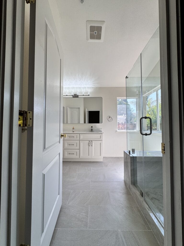 Vaulted-Ceiling Primary Bath Remodel with a Frameless Glass Shower — photo 16