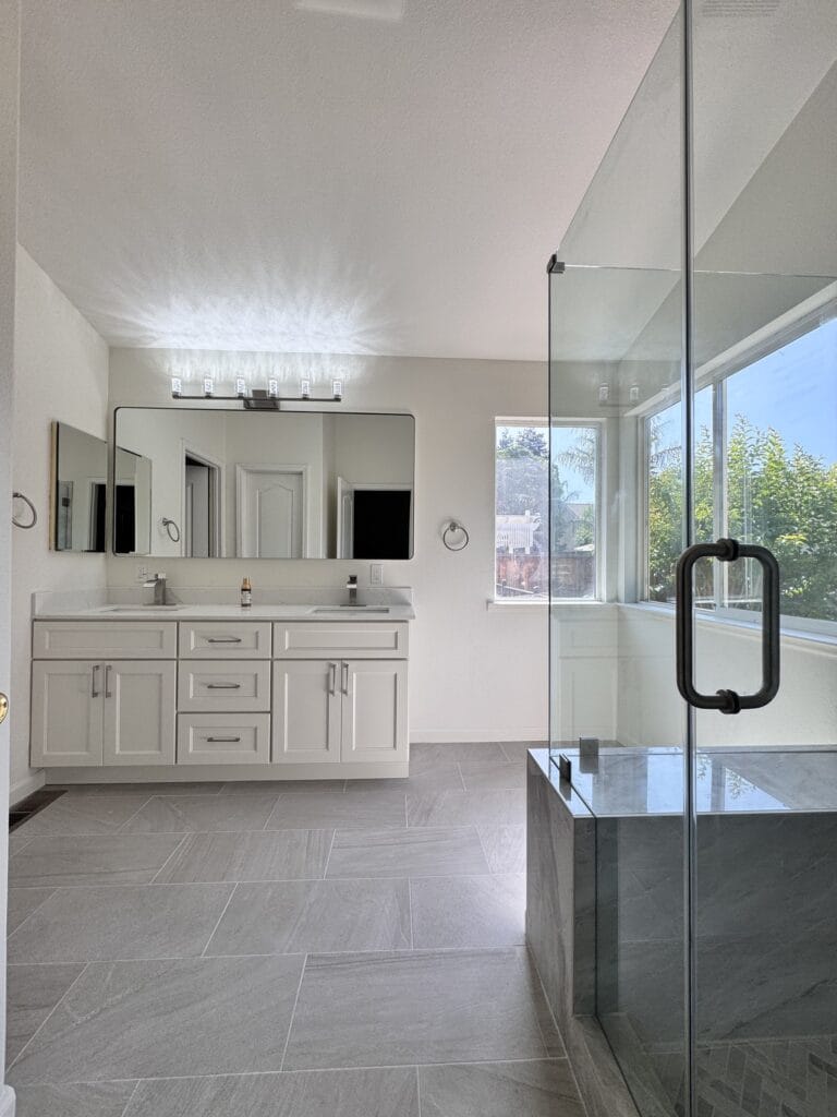 Vaulted-Ceiling Primary Bath Remodel with a Frameless Glass Shower — photo 17