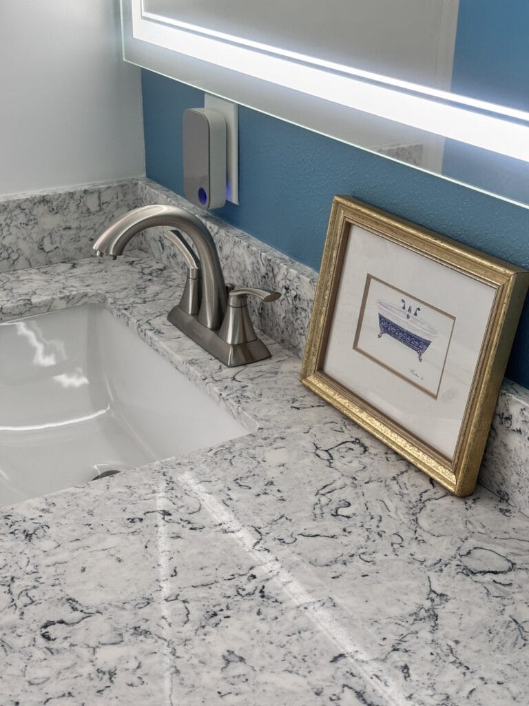 Sea-Glass Glazed Tile Bathroom Remodel with Double Vanity — photo 19