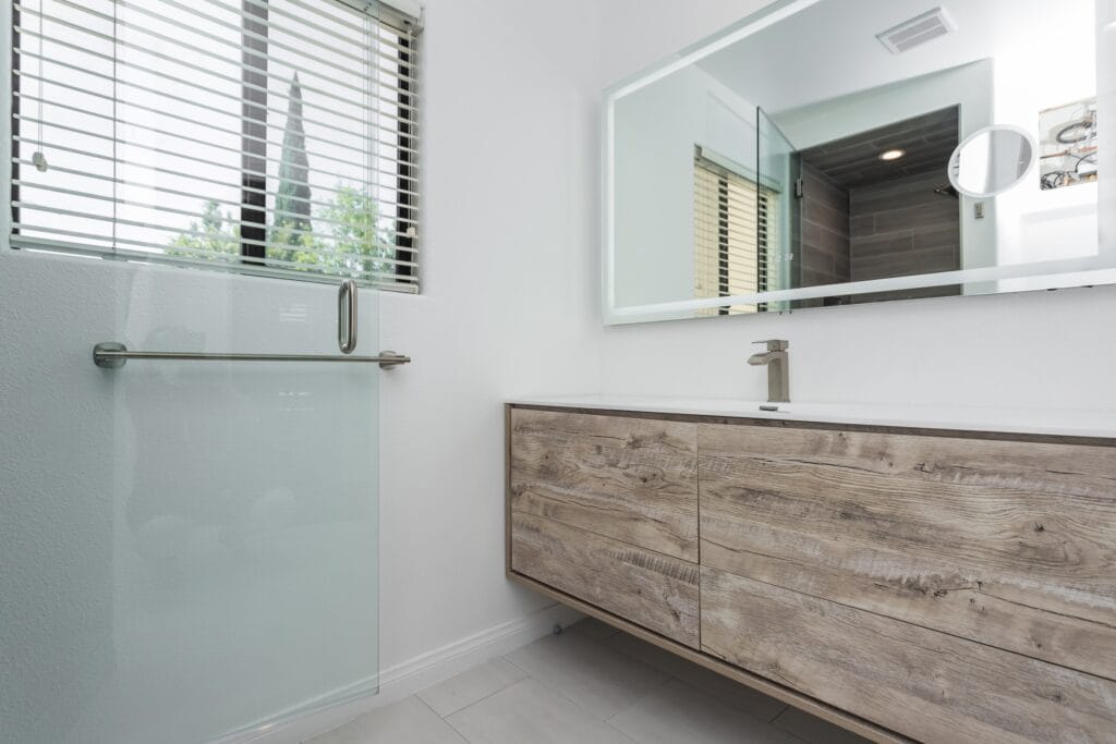 Whole-Home Bathroom Renovation with Spa Showers & a Freestanding Soaking Tub — photo 2