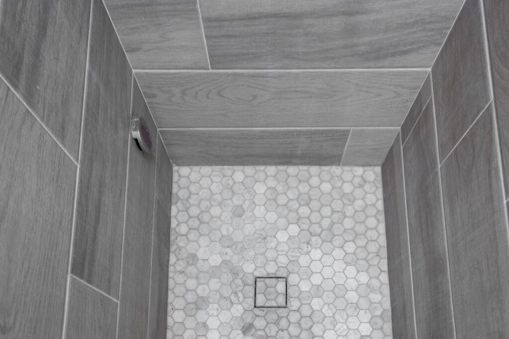 Whole-Home Bathroom Renovation with Spa Showers & a Freestanding Soaking Tub — photo 6
