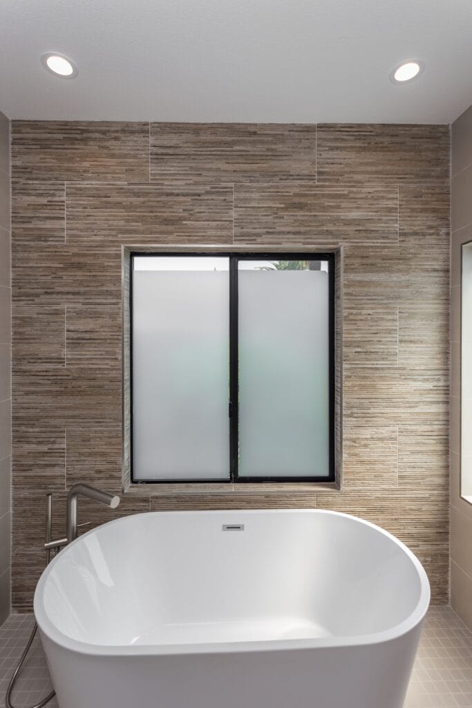Whole-Home Bathroom Renovation with Spa Showers & a Freestanding Soaking Tub — photo 16