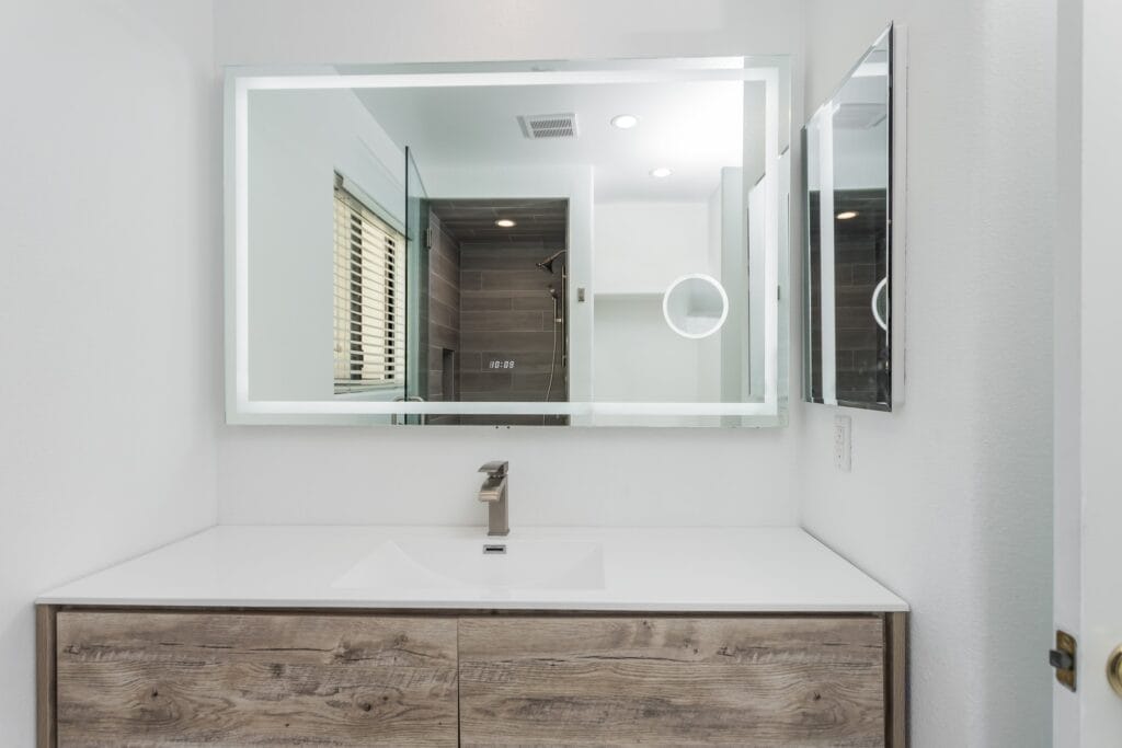 Whole-Home Bathroom Renovation with Spa Showers & a Freestanding Soaking Tub — photo 19