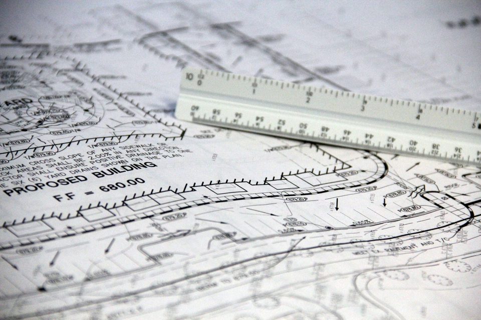 Civil site plan sheet with finish-floor elevation and drainage notes