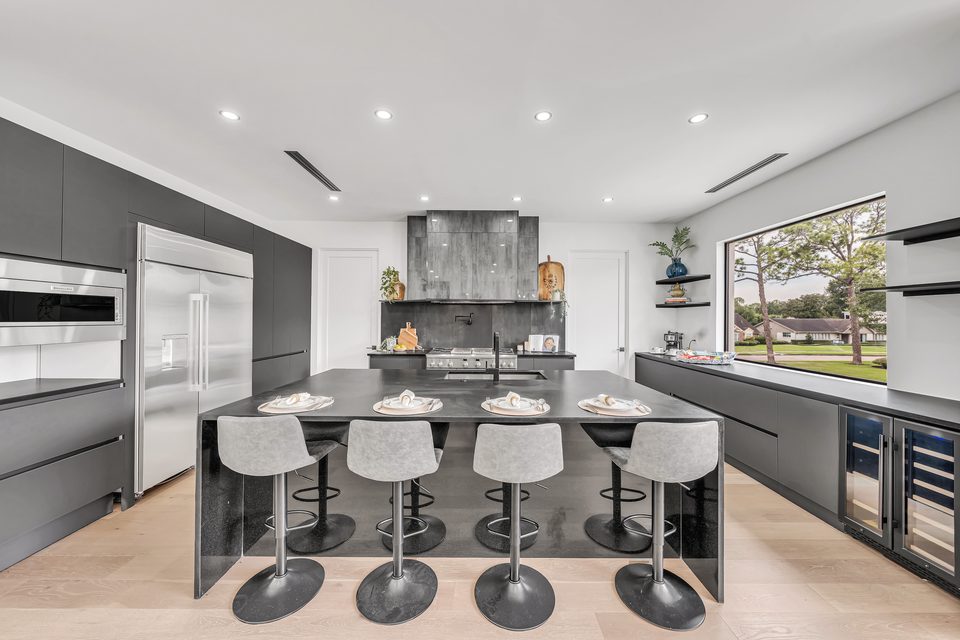 Contemporary kitchen with a long island and bar seating
