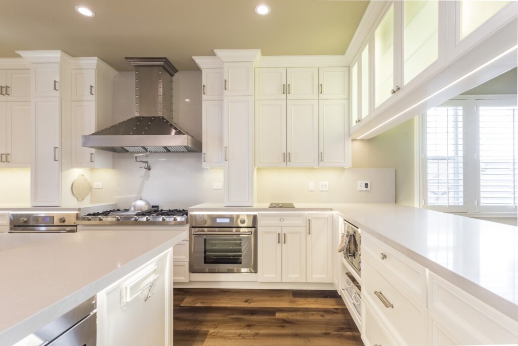 Chef-Grade Kitchen Remodel with Waterfall Quartz Island — photo 7