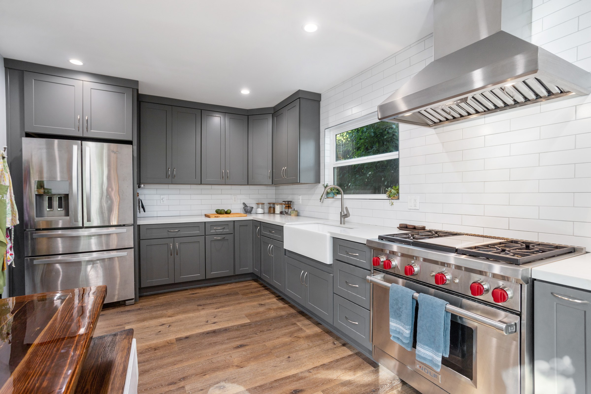 Gray Shaker Kitchen Remodel with Wolf Range & Farmhouse Sink