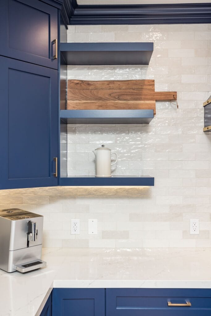 Navy Blue Shaker Kitchen with Brass Hardware and a Custom Range Hood — photo 20