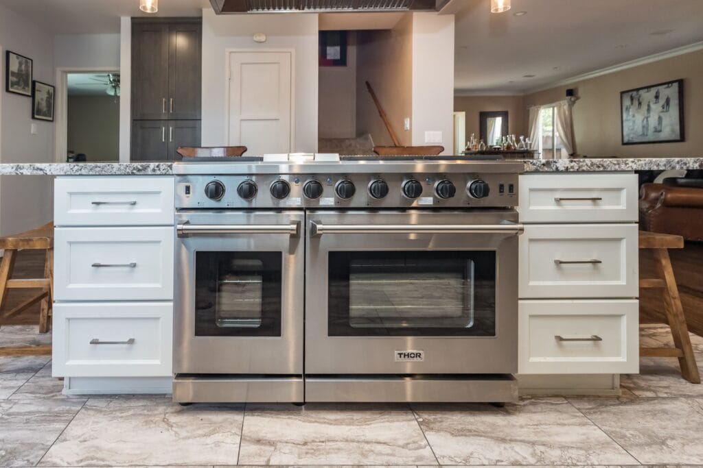 Two-Tone Kitchen Remodel with Professional Range Island — photo 13