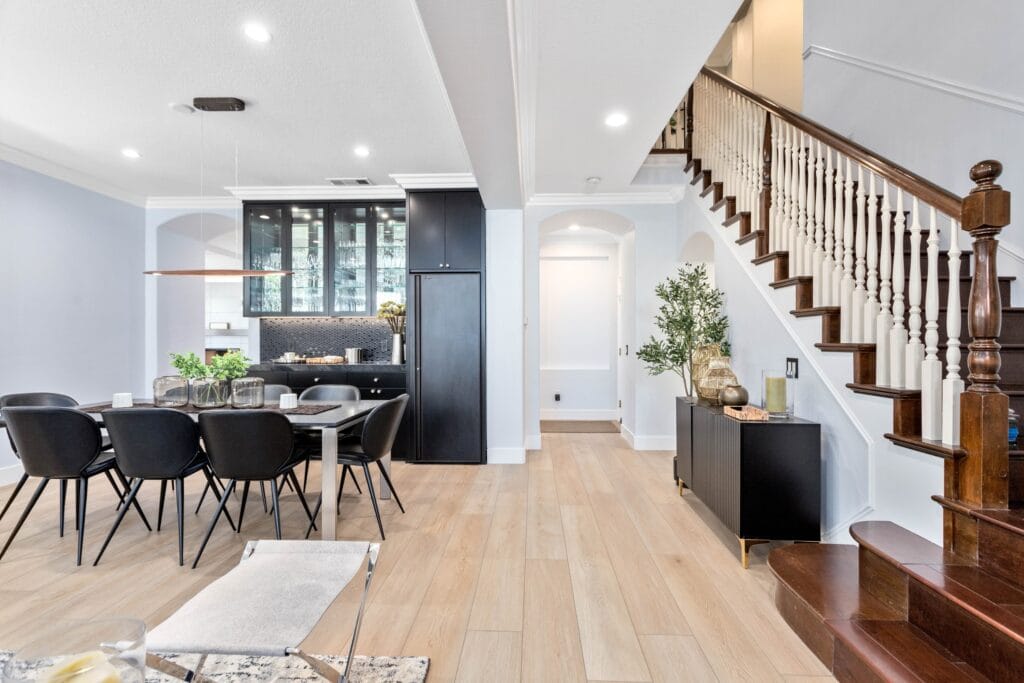Two-Tone Kitchen Remodel with Waterfall Stone Island — photo 2