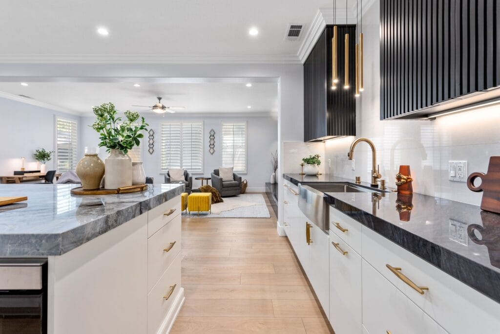 Two-Tone Kitchen Remodel with Waterfall Stone Island — photo 20