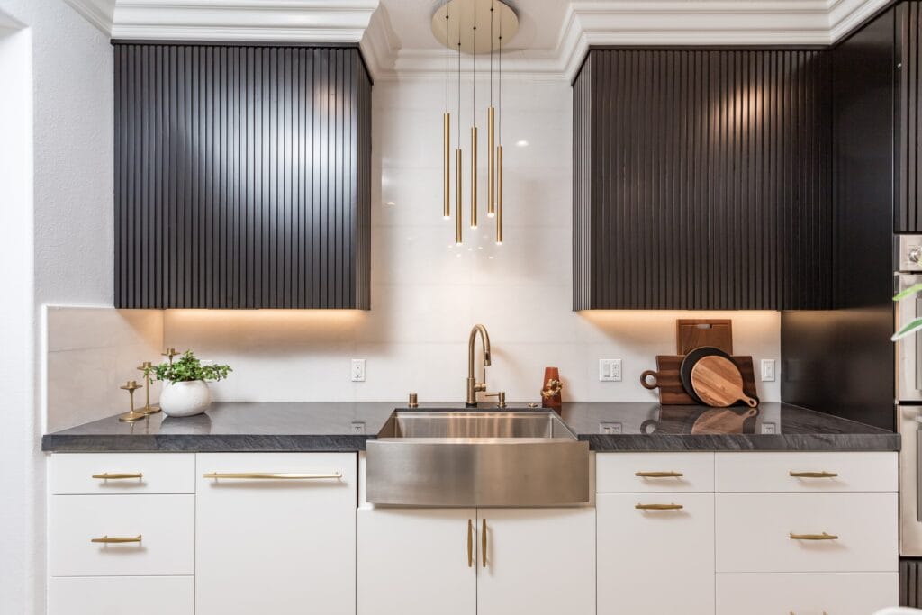 Two-Tone Kitchen Remodel with Waterfall Stone Island — photo 27