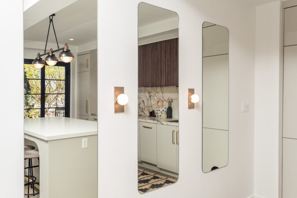Open-Concept Kitchen Remodel with Fluted Walnut Cabinetry and Bookmatched Marble — photo 6