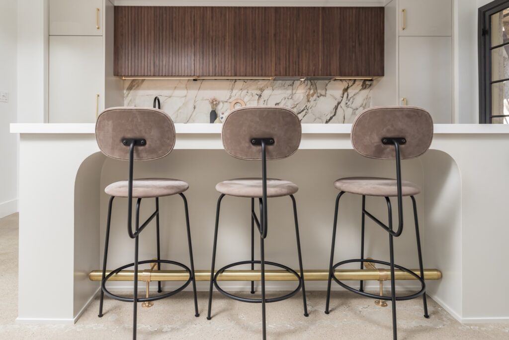 Open-Concept Kitchen Remodel with Fluted Walnut Cabinetry and Bookmatched Marble — photo 9
