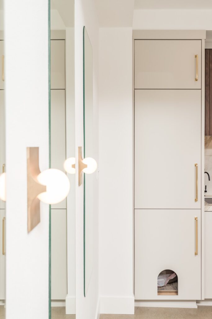 Open-Concept Kitchen Remodel with Fluted Walnut Cabinetry and Bookmatched Marble — photo 10