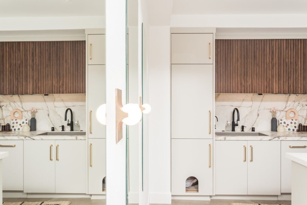 Open-Concept Kitchen Remodel with Fluted Walnut Cabinetry and Bookmatched Marble — photo 11