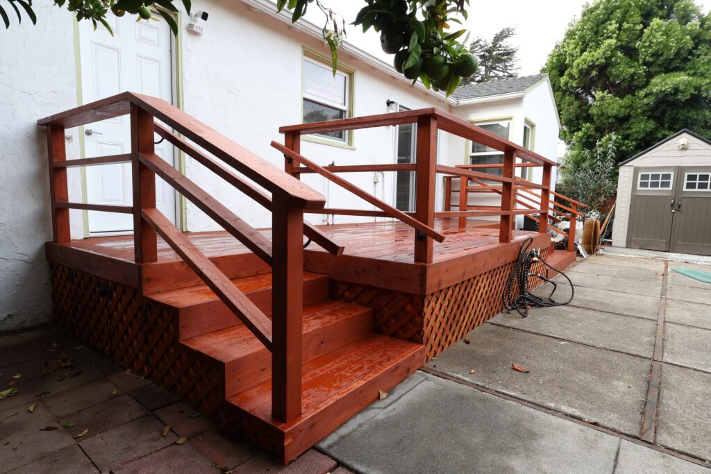 Custom Wood Deck with Staircase and Lattice Skirting — photo 3